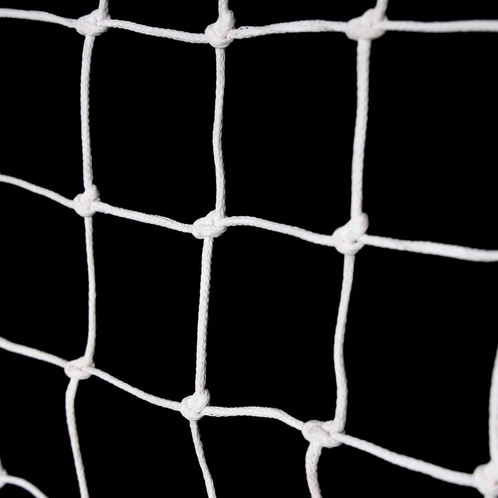 Close-up of Garware Monkey Net 50 MM mesh with white HDPE knots and border support for balcony protection