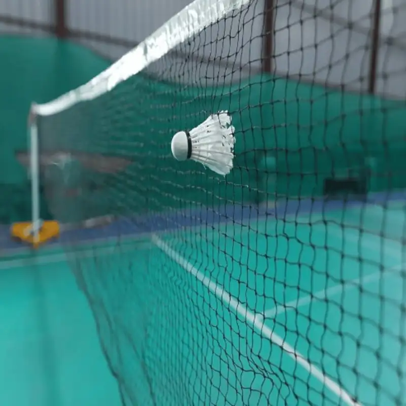 Garware Sportiva Badminton Net installed on an indoor court for practice and match play